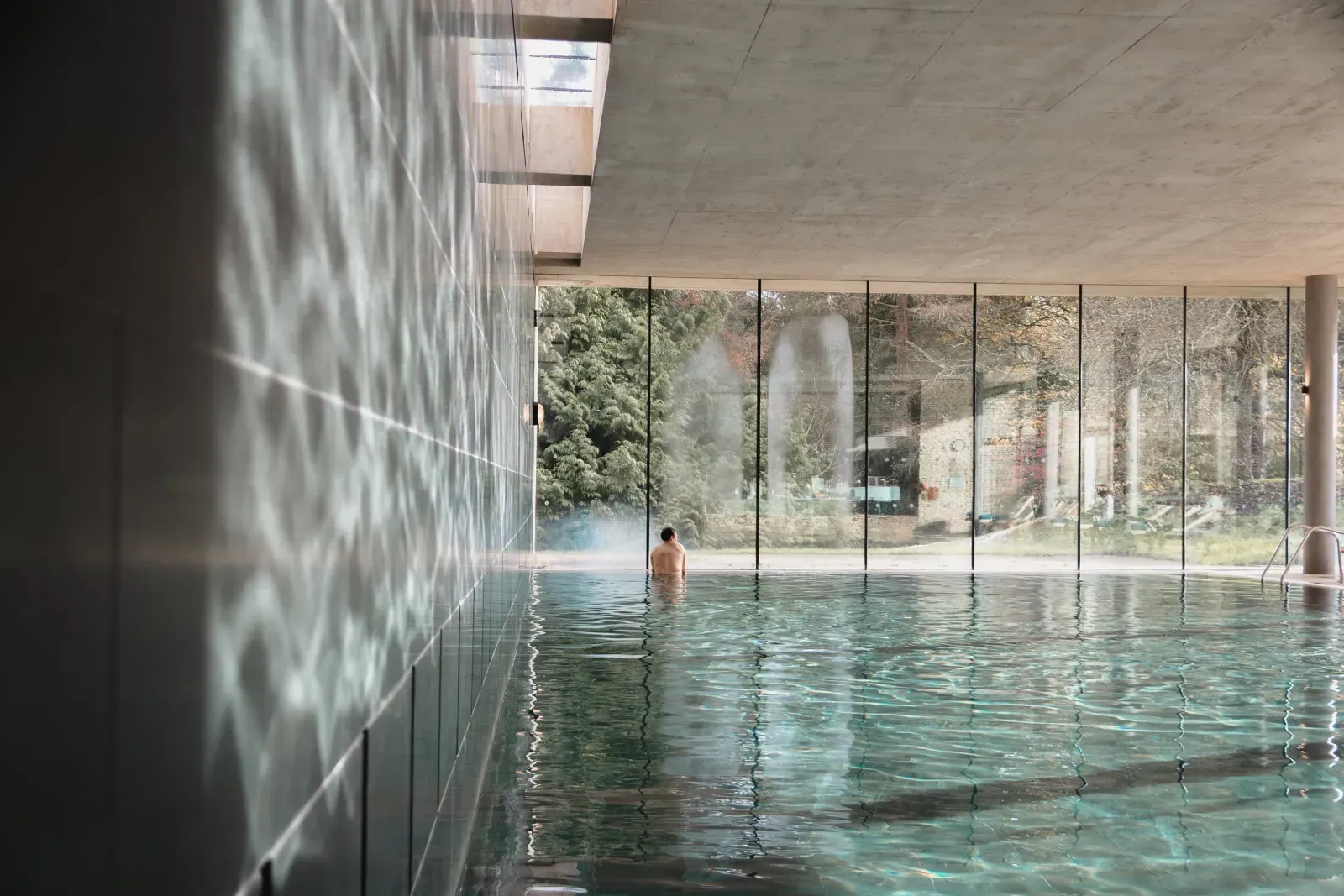 Slate-lined indoor swimming pool at C-Side Spa, Cowley Manor Experimental