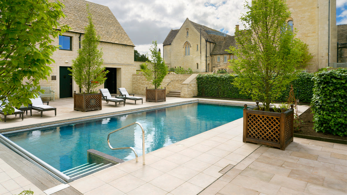 Heated outdoor pool at Ellenborough Park in the Cotswolds